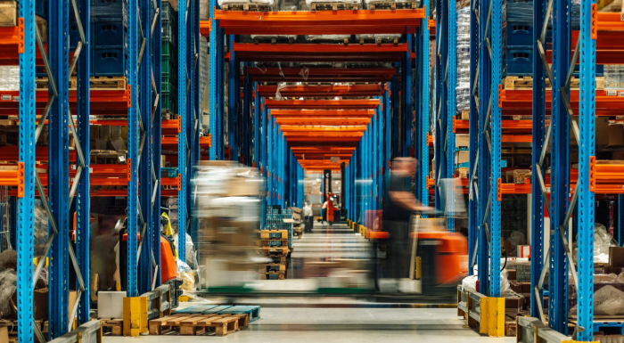 Forklift and pedestrian traffic conflict inside warehouse